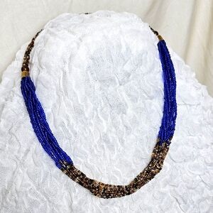 Maasai beadwork blue, browns, gold 22-in barrel clasp necklace